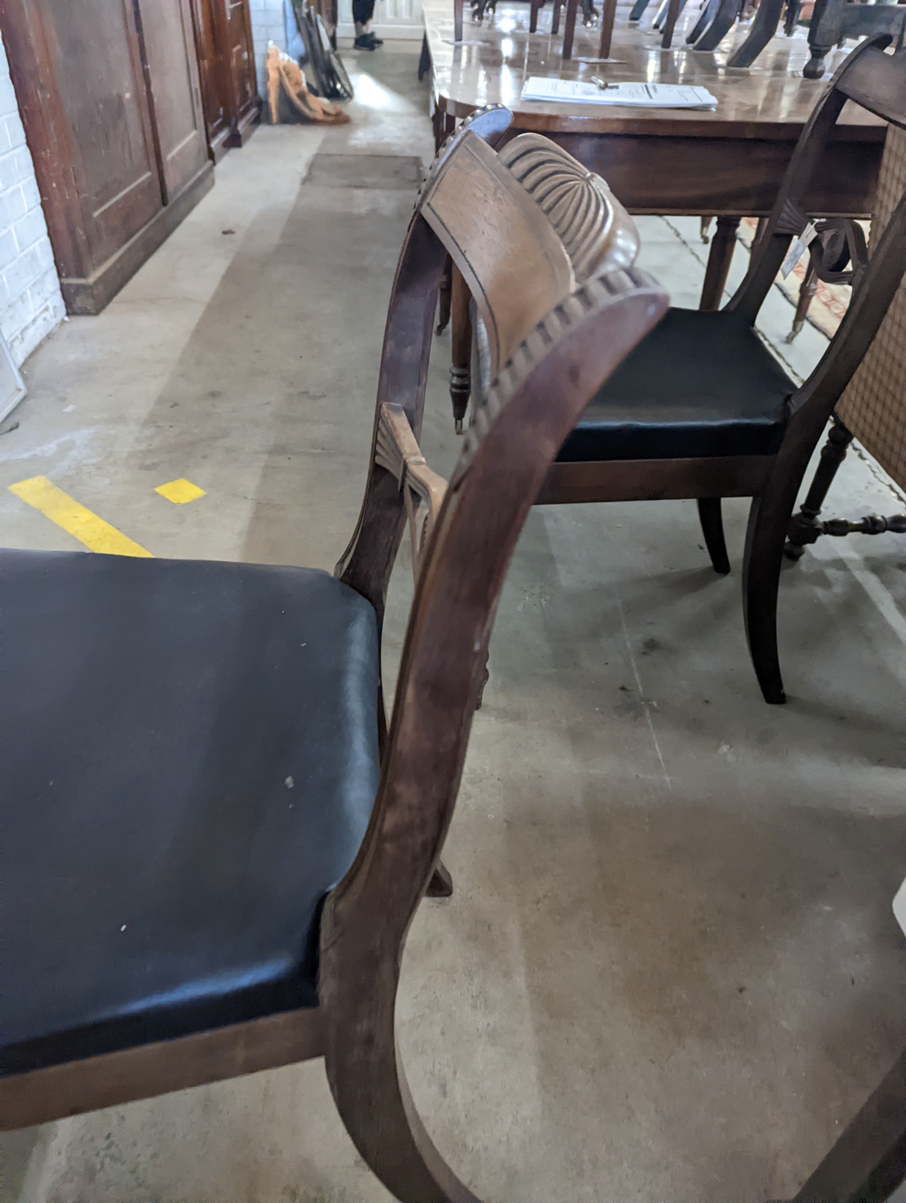 A pair of Regency mahogany dining chairs